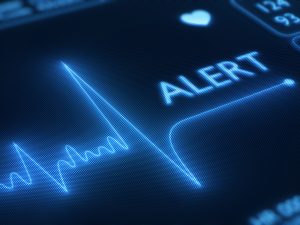 Flat line alert on a heart monitor - 3d render on detail pixellated screeen